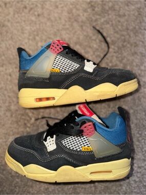 Union LA x Air Jordan 4 Retro 'Off
Noir'